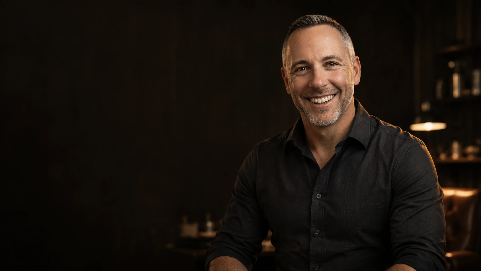 Matthew A. Buckley smiling in a warm, casual setting